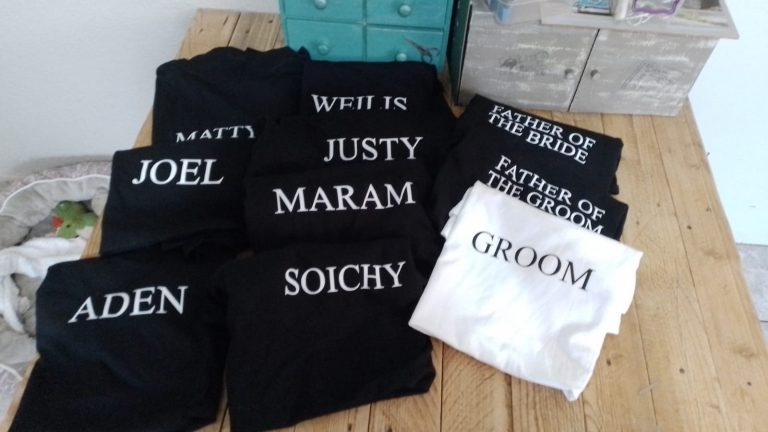 Black shirts embroidered with individual names