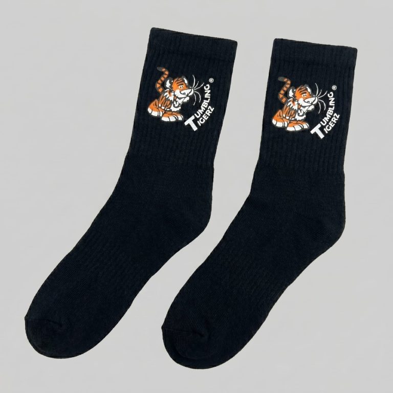 Pair of black socks printed with colourful fox graphics