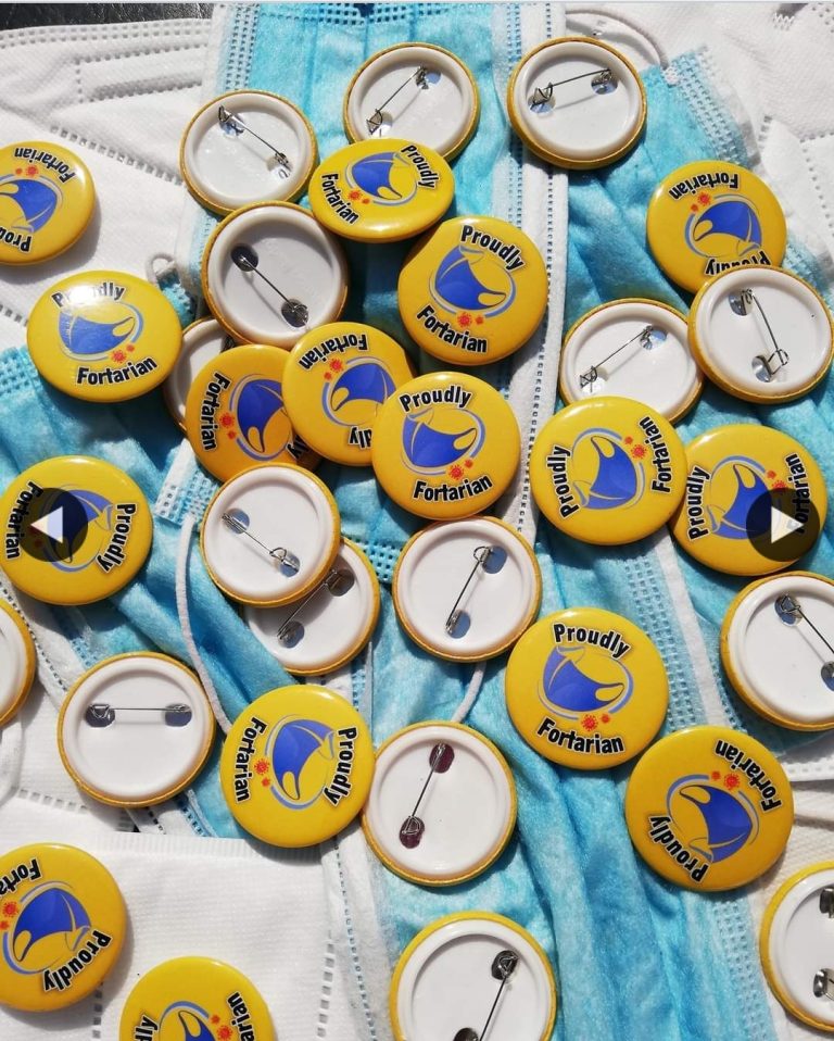 Collection of round blue and yellow promotional badges