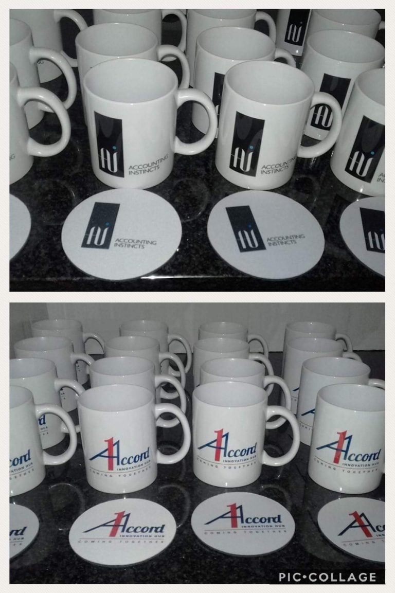 Collection of white mugs printed with black keyboard-style graphics