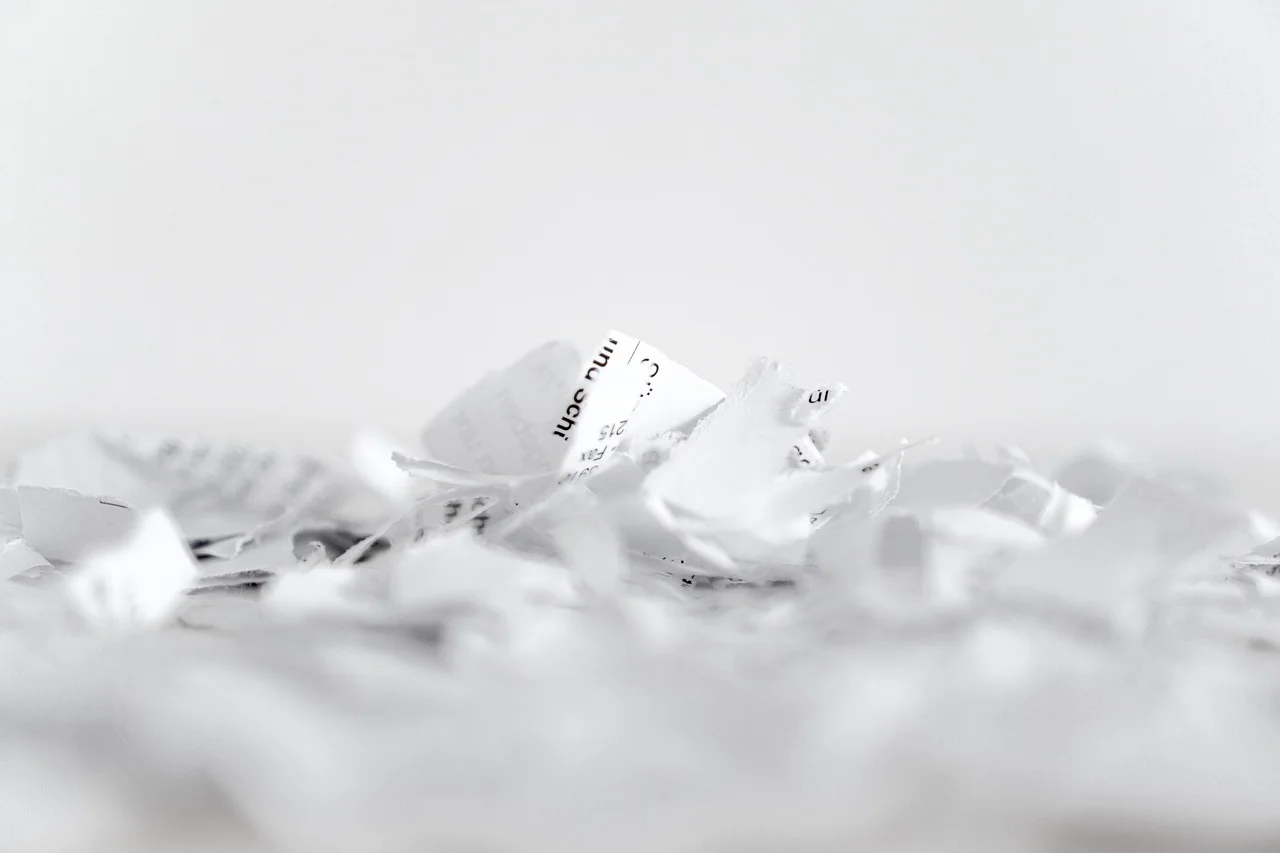 Shredded confidential documents representing secure document destruction
